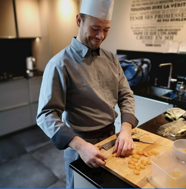 Home Chef Dubai Service - French Cuisine at Home Home chef Dubai working in client kitchen preparing authentic French cuisine